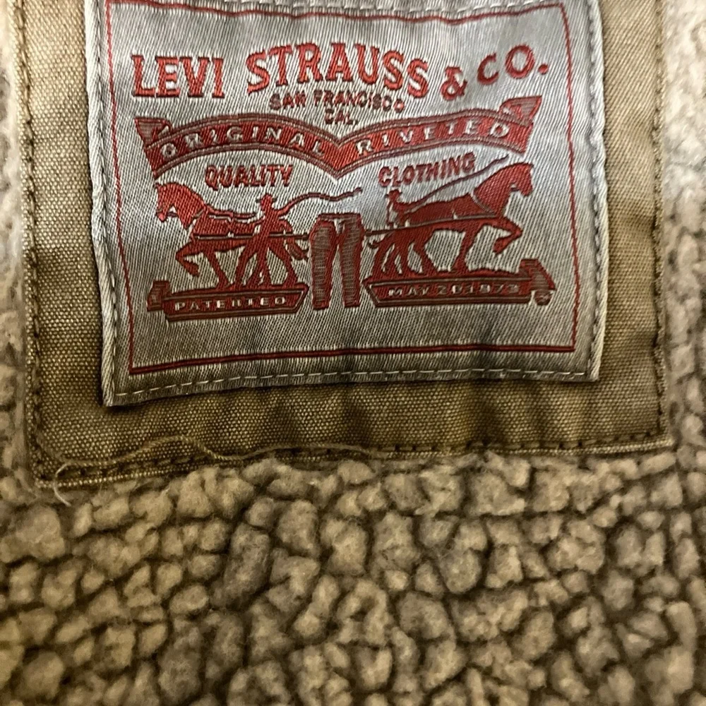 Levi’s canvas jacket with fleece lining and quotes arms Small Silver label